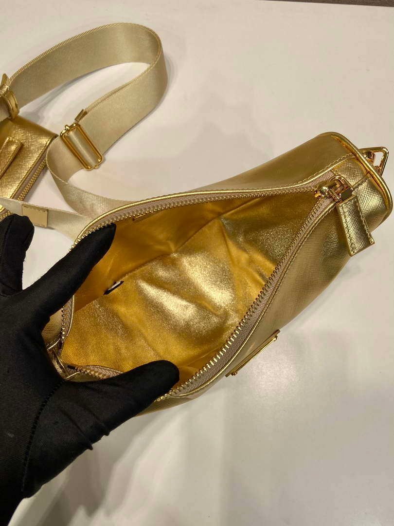 Replica Prada Leather Prada Triangle shoulder bag 1BH190 Gold